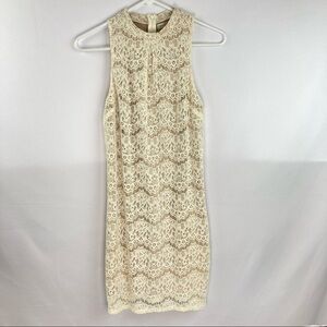 Sleeveless white lace dress